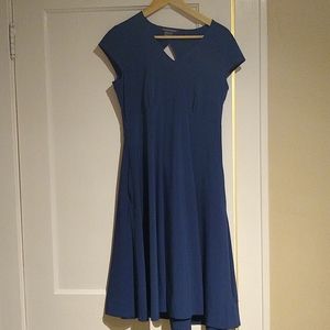 Ex officio blue dress with pockets and key hole back